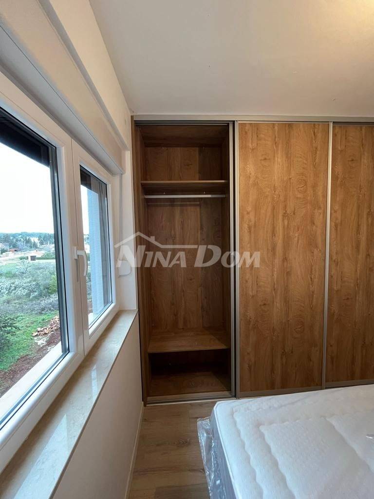 Luxusní třípokojový apartmán Ugljan se zahradou a společným bazénem a letní kuchyní - 13