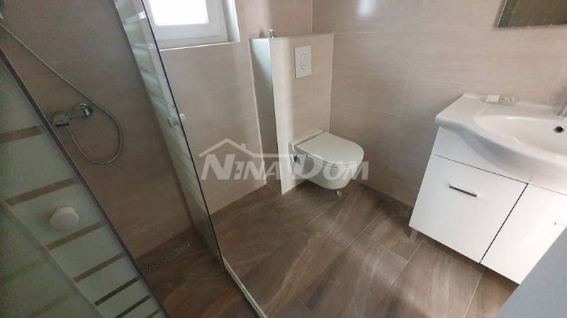 Nově postavená nemovitost se dvěma krásnými dvoupokojovými apartmány. - 6