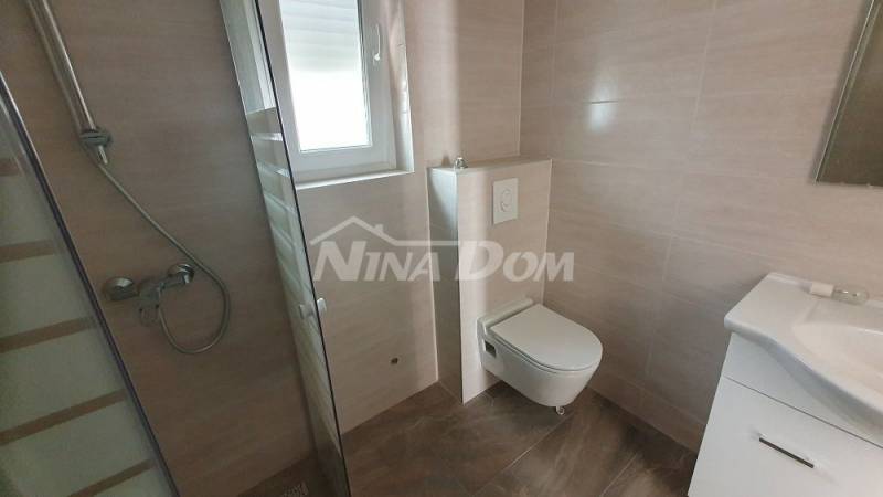 Nově postavená nemovitost se dvěma krásnými dvoupokojovými apartmány. - 7